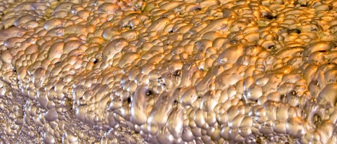 Gold mine process where the gold attaches to the bubbles during the process. Gold mine process where the gold attaches to the bubbles during the process.