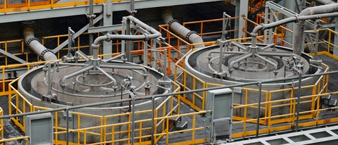 Set of floatation machines separating mineral ore at mining and concentrating plant. Equipment for purification of materials at factory