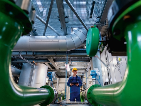 Production facility for the plant protectant Xemium at BASF's Ludwigshafen Verbund site. Xemium® belongs to the chemical class of carboxamides. BASF research teams have thus developed a high-performance active ingredient that helps farmers worldwide to control fungal diseases in various crops. These include for example soybean rust and septoria in cereals. The This highly efficient fungicide ensures consistently high yields for farmers. Plant operator Philipp Krämer during an inspection tour of the plant. He is using a mobile device, which for example generates maintenance messages on site.